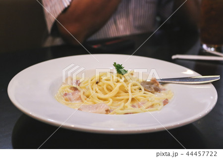 Spaghetti Carbonara with bacon. 44457722
