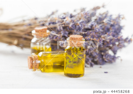 Wellness treatments with lavender flowers on wooden table. 44458268