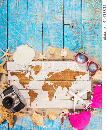 Summer traveling time. Sea holiday background with various shells. 44458355