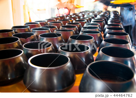 alms bowl background 44464762