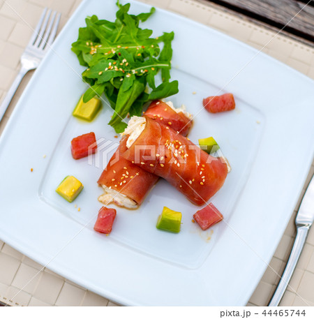rolls of tuna with crab meat on the plate rolls of tuna with crab meat on the plate 44465744