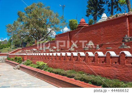 Red wall in the  complex Pashupatinath Temple 44466632