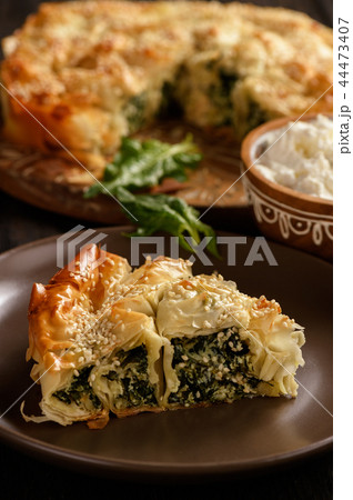 Burek or borek, balkanian puff pastry with spinach 44473407
