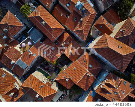 Old houses with red-orange roofs in Budva in Montenegro 44483608
