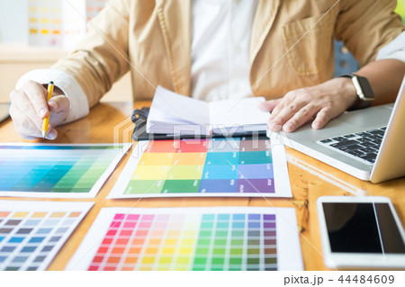 Creative Graphic designer at work. Color swatch samples pantone Creative Graphic designer at work. Color swatch samples pantone 44484609