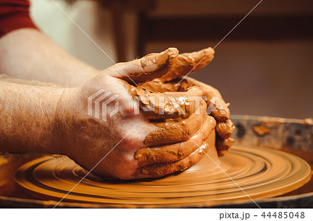 Potter makes a jug Potter makes a jug 44485048