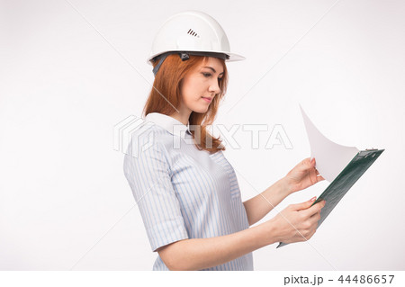 Architect, worker and realtor concept - woman builder or engineer with documents on white background 44486657