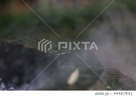 smoke on the water at brick well blur background smoke on the water at brick well blur background 44487641