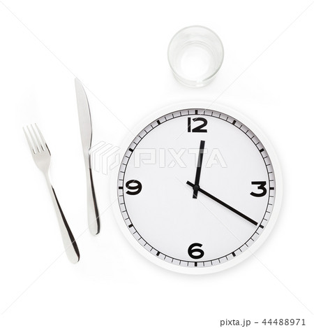 Fork, knife, glass, and white round clock Fork, knife, glass, and white round clock 44488971