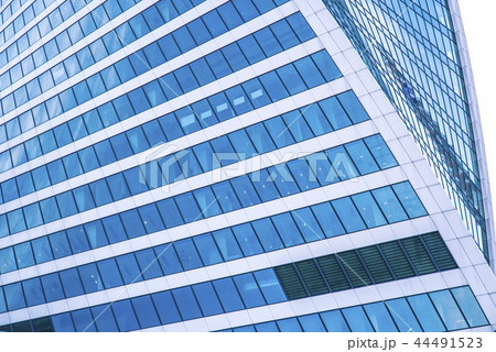 Glass facade of a business center with reflection of light rays Glass facade of a business center with reflection of light rays 44491523