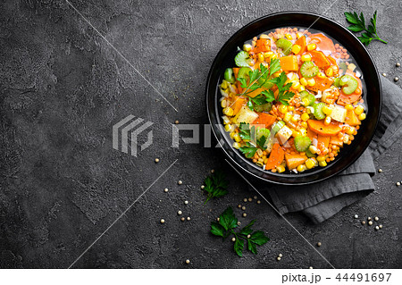 Healthy vegetarian vegetable soup with lentil 44491697