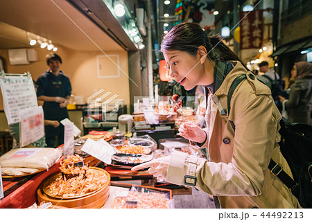 tourist pointing to the Japanese street food tourist pointing to the Japanese street food 44492213