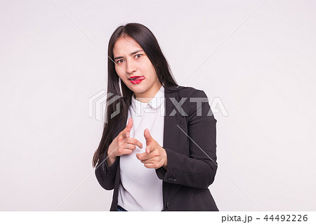 People and gesture concept - asian woman dressed in white shirt and black jacket showing bang-bang 44492226
