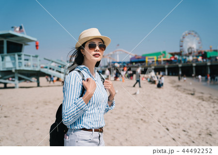 tourist relaxing seeing the view of the beach 44492252