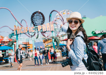 tourist excited pointing to the amusement park 44492260