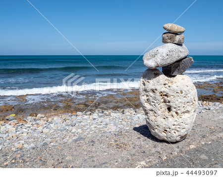 Stone figure on the waterfront, Crete, Greece Stone figure on the waterfront, Crete, Greece 44493097
