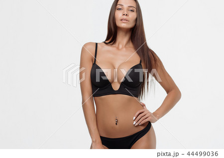 Young beautiful girl shows her gorgeous Breasts 44499036