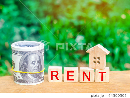 Wooden house, money with the inscription rent. Wooden house, money with the inscription rent. 44500505