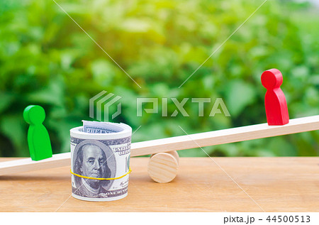 wooden figures of people on scales and dollars 44500513