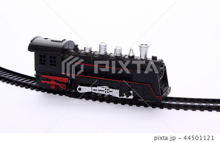 toy locomotive on the railroad tracks 44501121