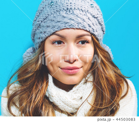 Happy young woman in winter clothes Happy young woman in winter clothes 44503083