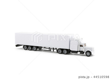 White long truck miniature with a trailer on white White long truck miniature with a trailer on white 44510598