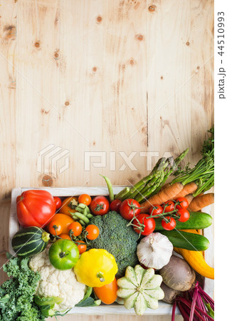 Summer vegetables on white table 44510993