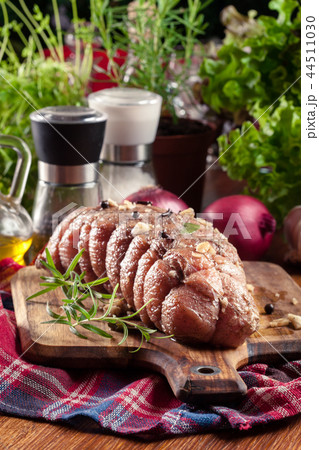 Marinated pork ham ready for roasting 44511030