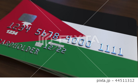 Plastic bank card featuring flag of Jordan. 3Drendering 44511312