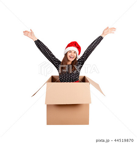 woman in dress and christmas hat isolated on white woman in dress and christmas hat isolated on white 44519870