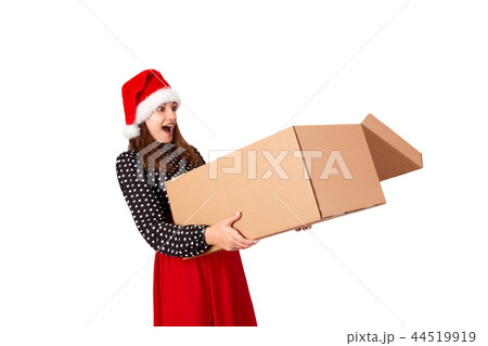 woman in dress and christmas hat isolated on white 44519919