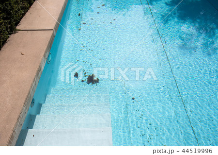 Dirty swimming pool which need to be cleaned Dirty swimming pool which need to be cleaned 44519996