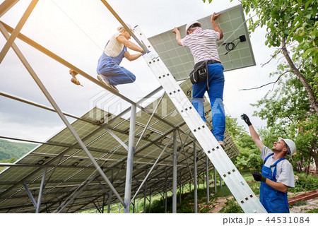 Installing of solar photo voltaic panel system 44531084