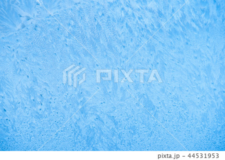 frost pattern on window in winter season, close up 44531953