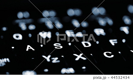 Closeup of laptop keyboard illumination. Computing 44532434