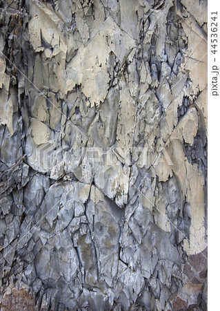 Texture of a mountain gray-blue rock wall Texture of a mountain gray-blue rock wall 44536241