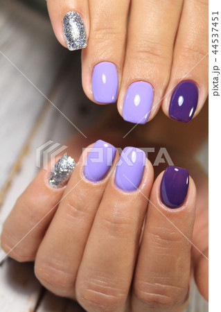 Women's hands with a stylish manicure. Best 44537451