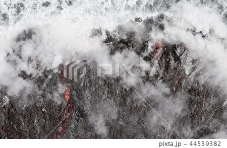 Lava Flow Into The Ocean At Kilauea Active Volcano Lava Flow Into The Ocean At Kilauea Active Volcano 44539382