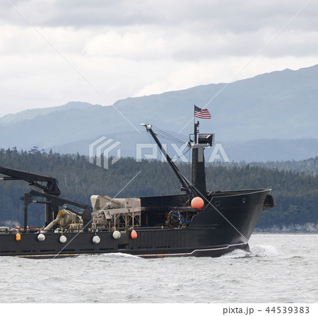 Commercial crab fishing vessel near Juneau, Alaska Commercial crab fishing vessel near Juneau, Alaska 44539383