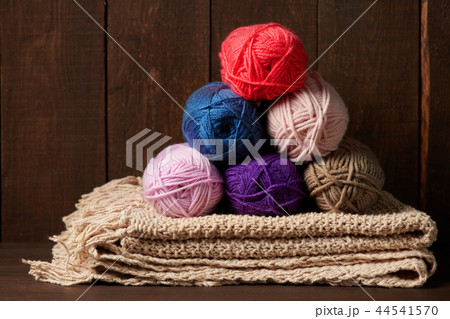 colorful wool threads for knitting on wooden 44541570