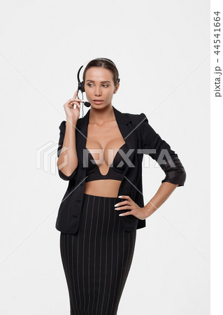Lady with deep neckline and head microphone 44541664