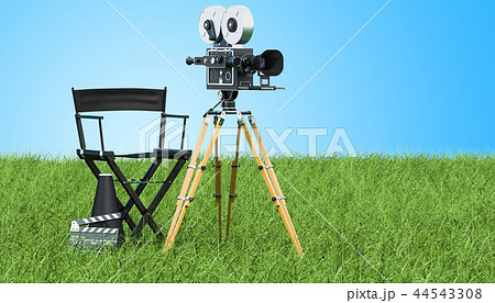 Cinema concept. Movie camera with film reels 44543308
