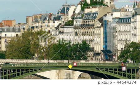 View to the bridge and traditional residential houses in Paris, France 44544274
