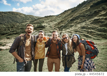 Happy friends are hiking in highland together 44545672