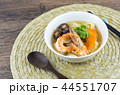 Shrimp wonton with braised pork in soup on wooden  44551707