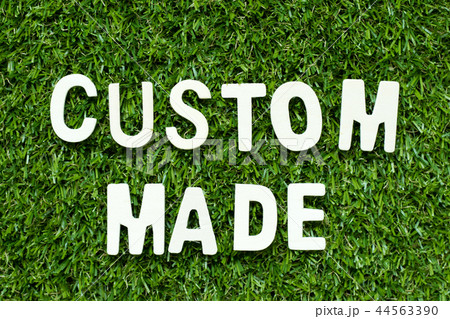 Alphabet letter in word custom made on green grass Alphabet letter in word custom made on green grass 44563390