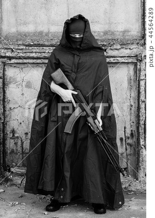 Man with machine gun Man with machine gun 44564289