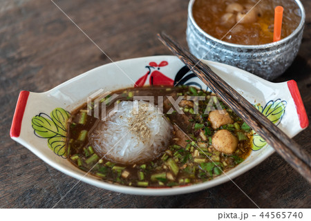 Braised beef clear noodle with meat ball soup stew 44565740