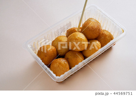 A plastic box of Hong Kong-style curry fish balls 44569751