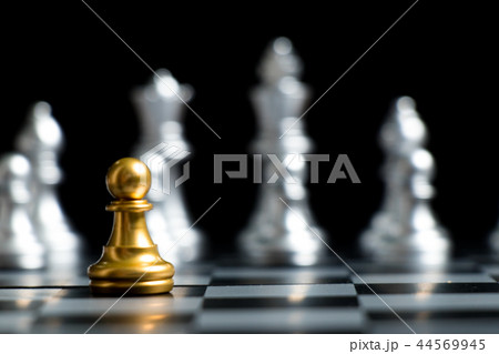 Gold pawn chess piece face with silver team Gold pawn chess piece face with silver team 44569945